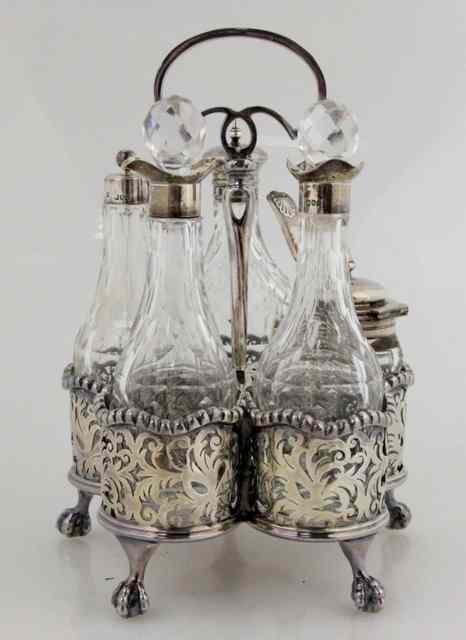 Appraisal: A Victorian silver cruet stand Thomas Blake London with beaded