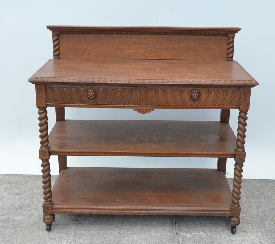 Appraisal: CARVED OAK SIDEBOARD Backsplash with carved barley twist half columns