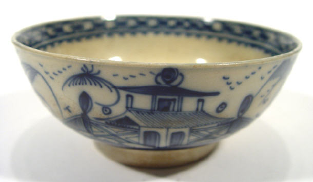 Appraisal: Early th Century English pottery bowl hand painted with blue