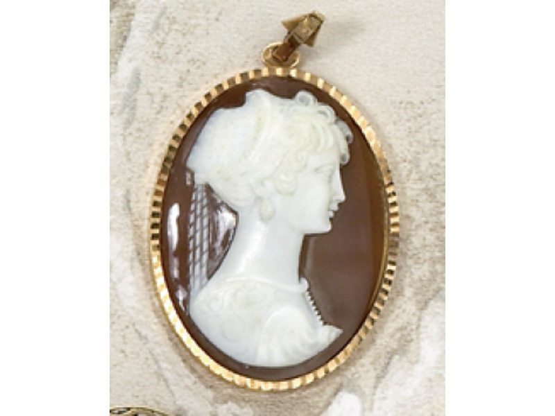 Appraisal: CAMEO PENDANT k yellow gold with silhouette figure measuring inch