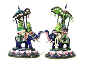 Appraisal: Two Indian enamelled white metal models of elephants with howdahs