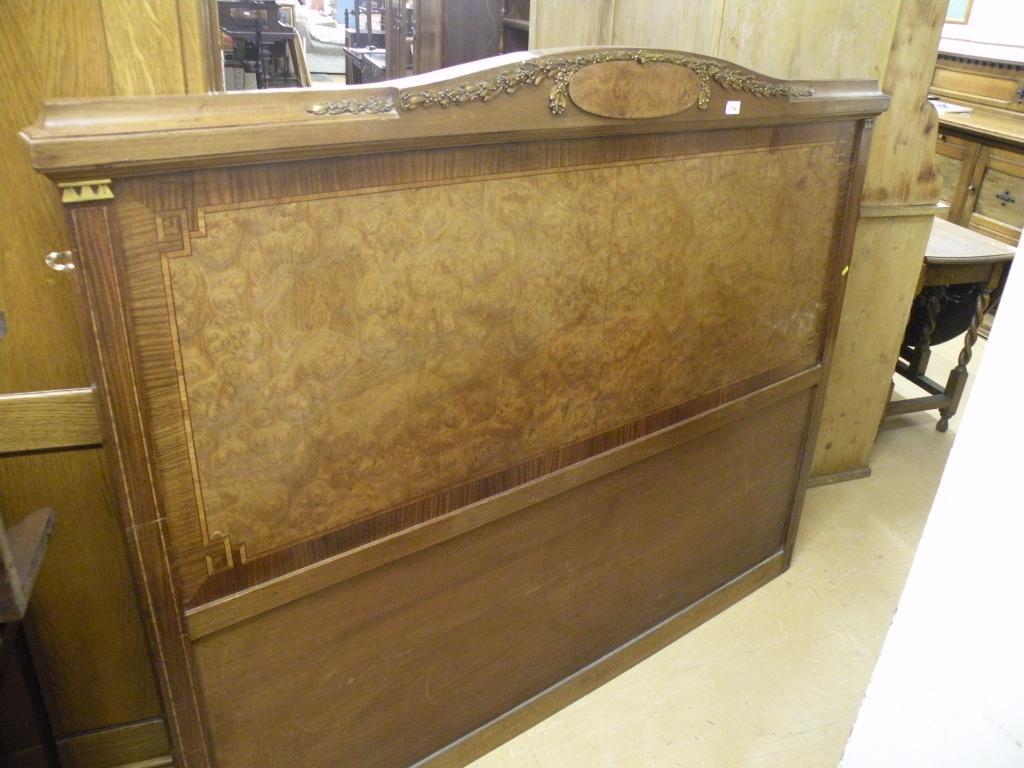 Appraisal: A French burr walnut kingwood and tulipwood banded head board