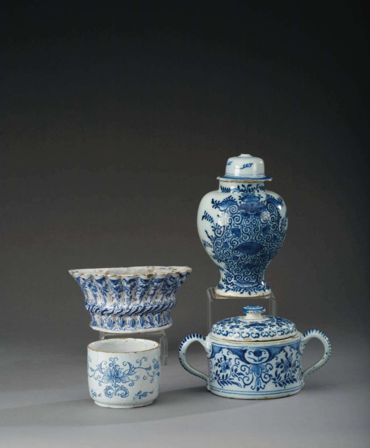 Appraisal: DUTCH DELFT BLUE AND WHITE TWO-HANDLED TUREEN AND A COVER