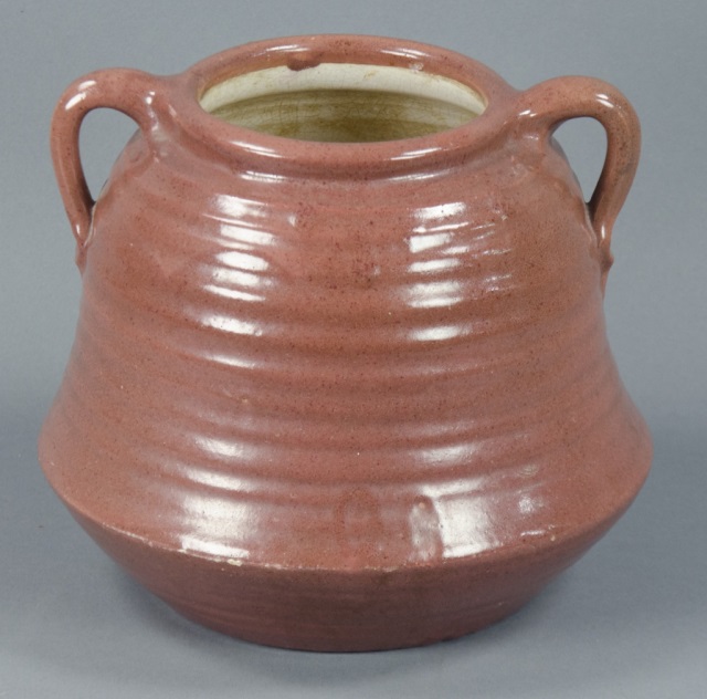 Appraisal: Sunset Mountain Pottery VaseIn brick-color glaze ribbed Squat form with