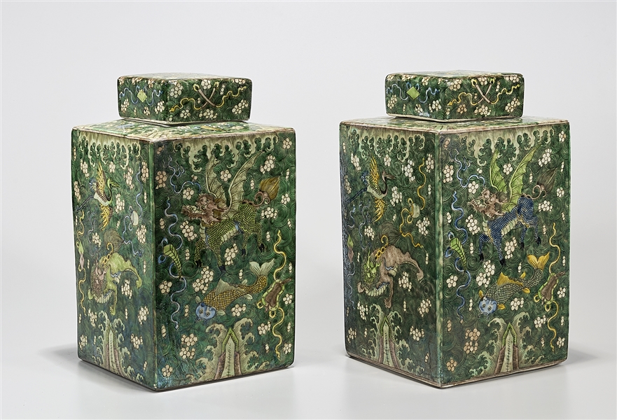 Appraisal: Pair of Chinese famille verte porcelain four-faceted covered containers depicting