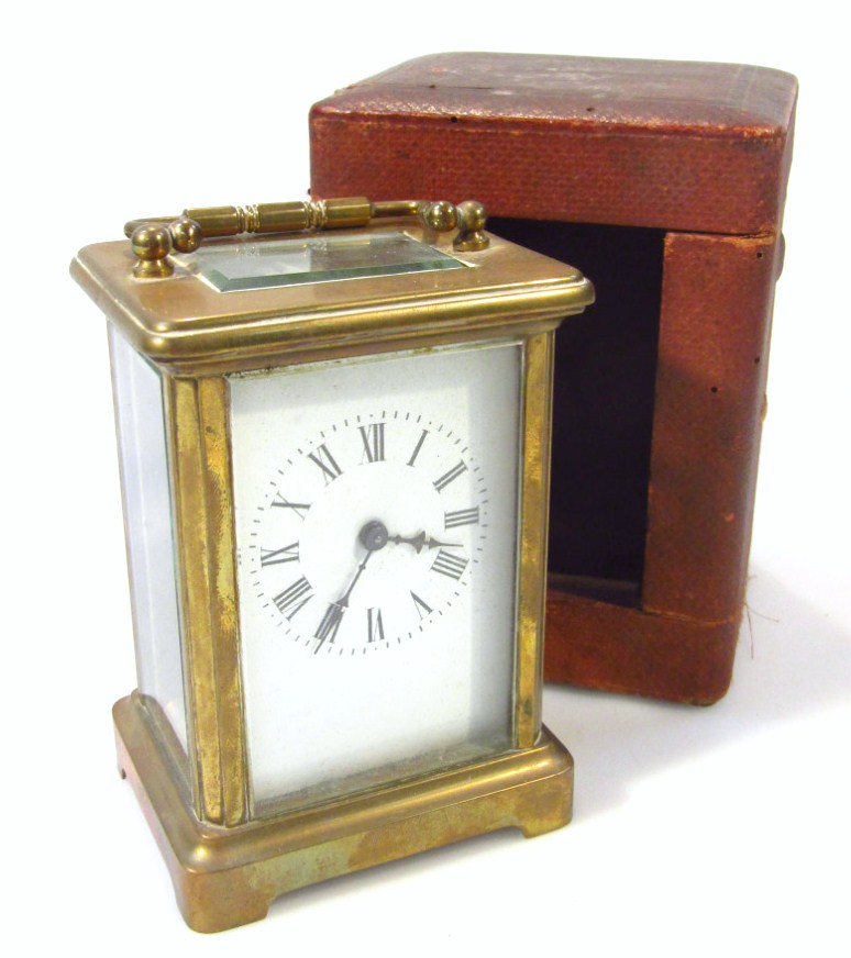 Appraisal: An early thC brass cased carriage clock the rectangular outline