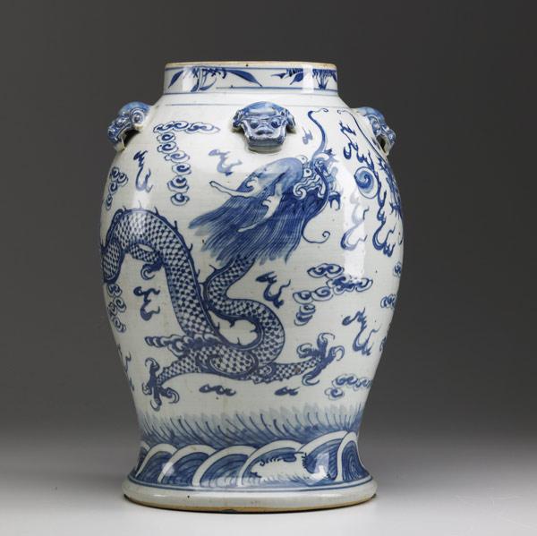 Appraisal: CHINESE EXPORT Blue and white urn with dragon decoration on