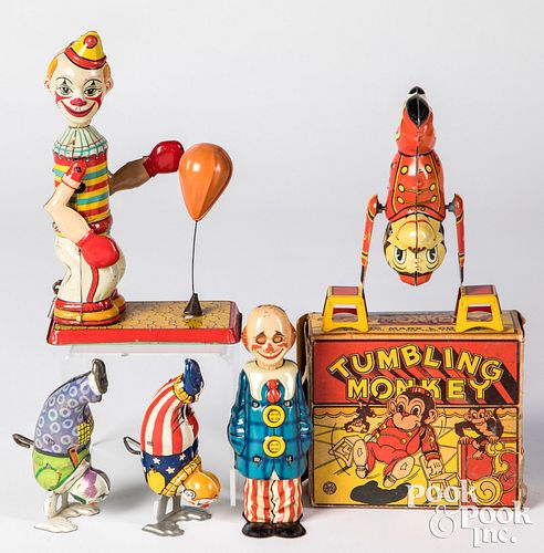 Appraisal: FIVE LITHOGRAPHED TIN WIND-UP TOYSFive lithographed tin wind-up toys to