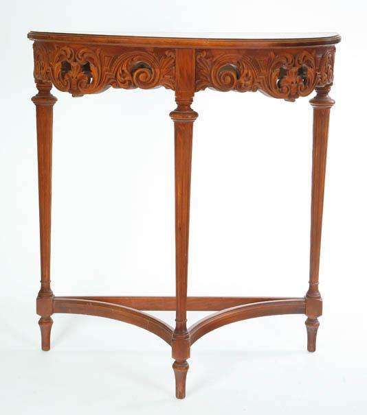 Appraisal: CARVED SIDE TABLE Oak with a D shaped top carved