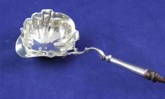 Appraisal: A late George II silver punch ladle with turned wooden