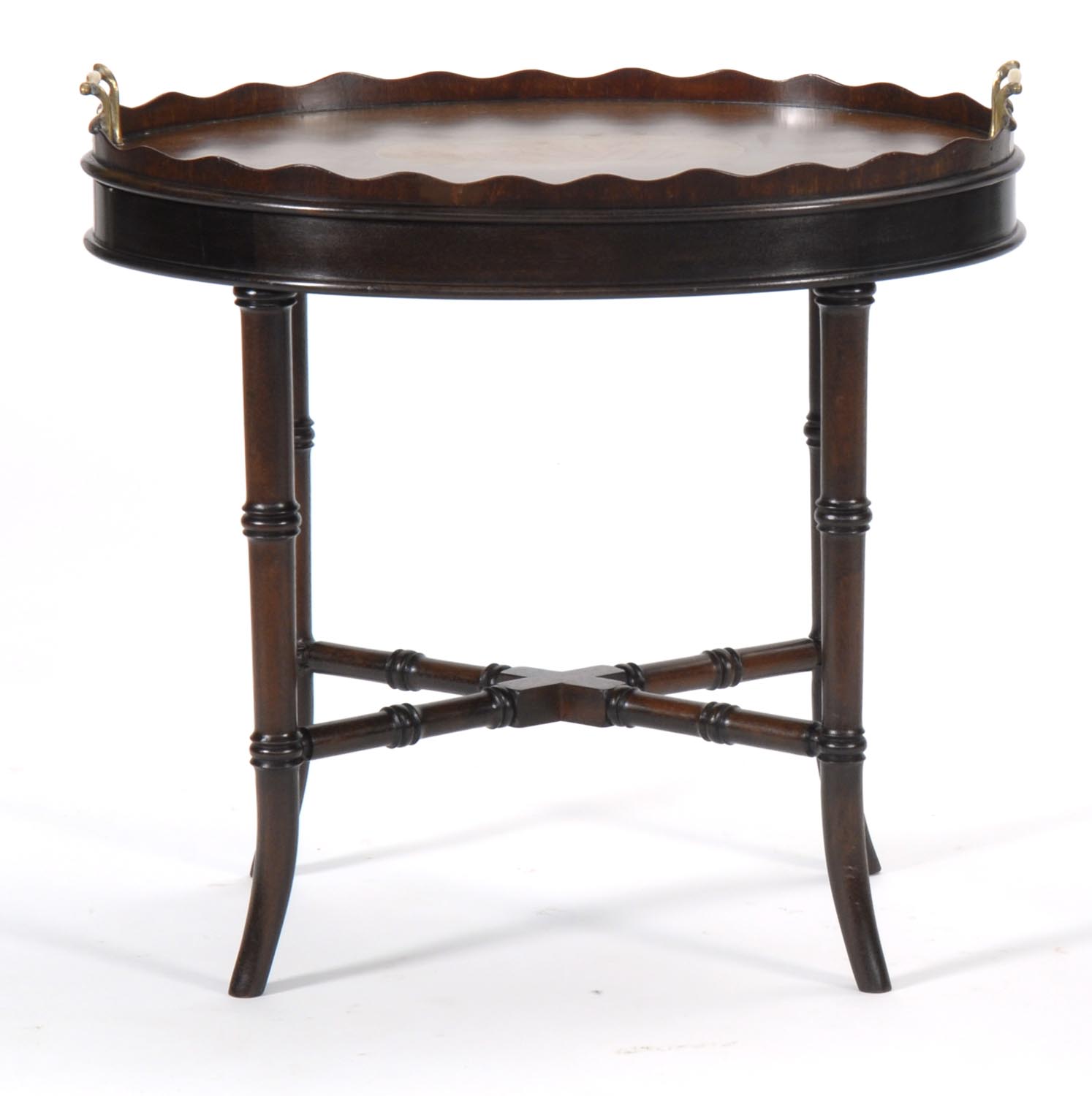 Appraisal: MAHOGANY TRAY TABLE with brass-handled mahogany tray with conch shell