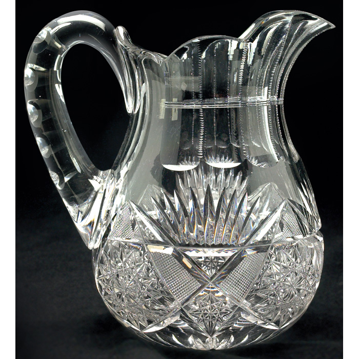 Appraisal: Cut Glass pitcher bulbous form with hobstar designs and notches