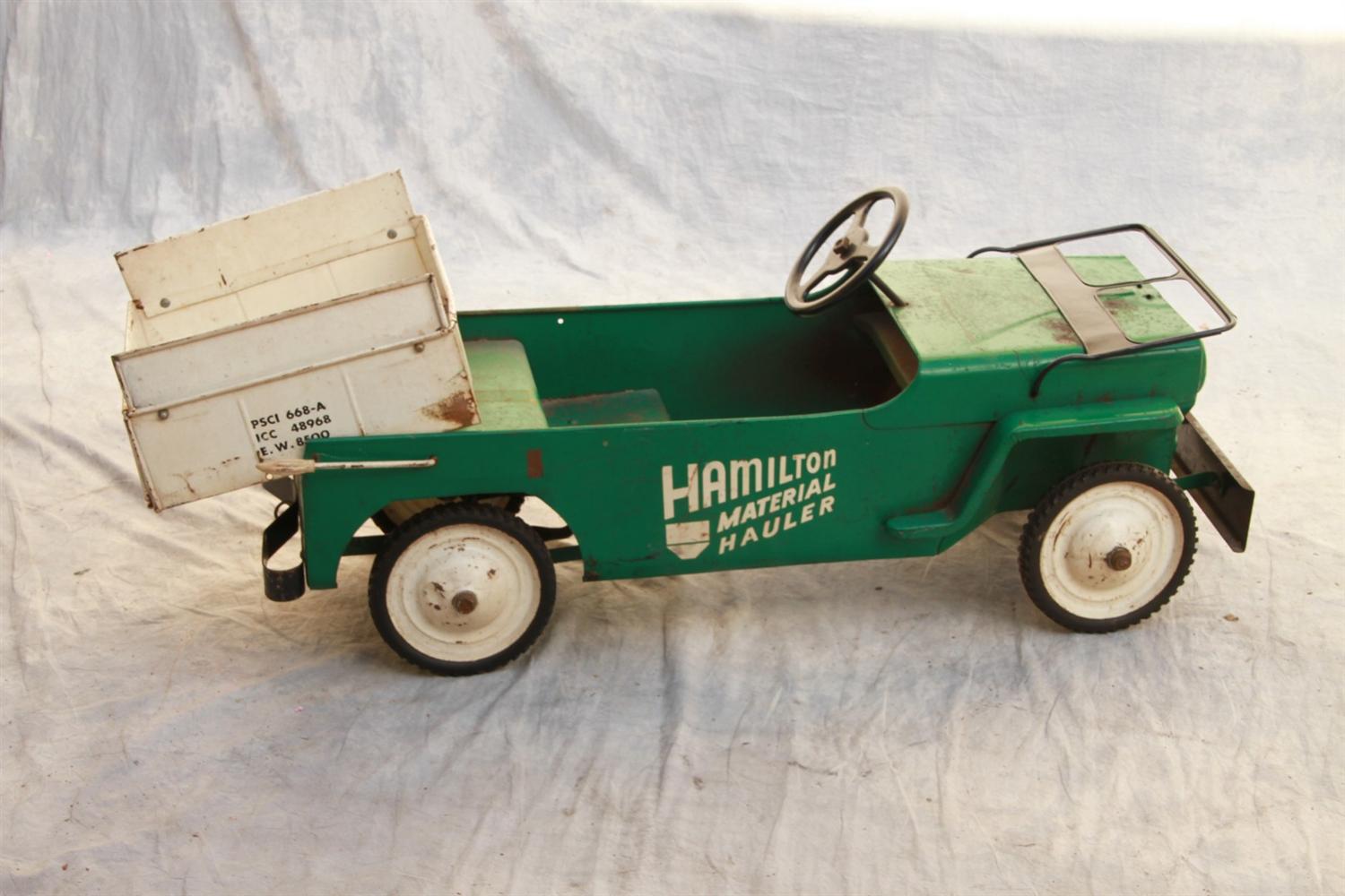 Appraisal: Hamilton Material Hauler pedal car green with white dump bucket