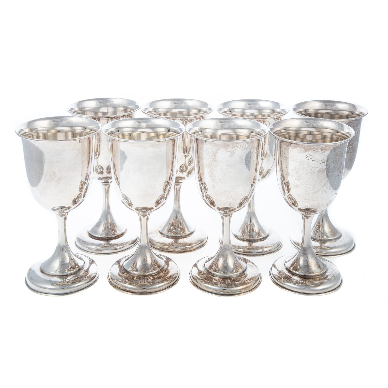 Appraisal: EIGHT STERLING GOBLETS sterling standard stepped circular foot supporting generous