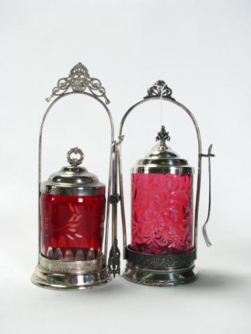 Appraisal: Two silver plate and glass pickle caster sets including one