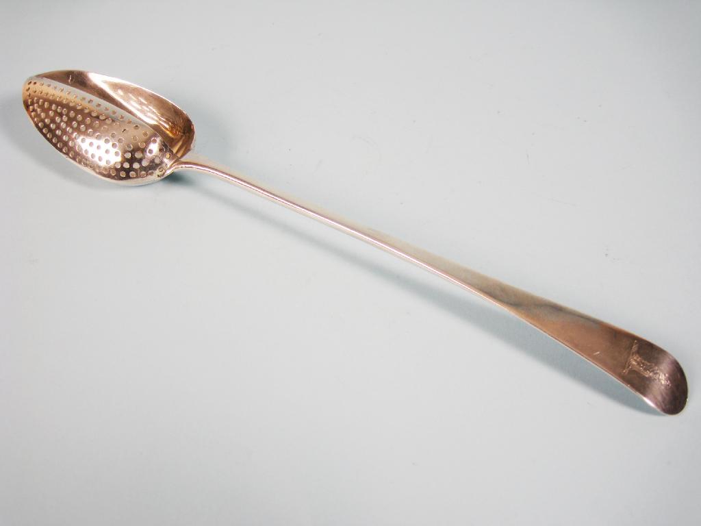 Appraisal: A George III Gravy Spoon with strainer Old English pattern