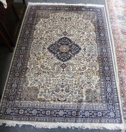 Appraisal: A small Pakistan carpet the ivory field with a black