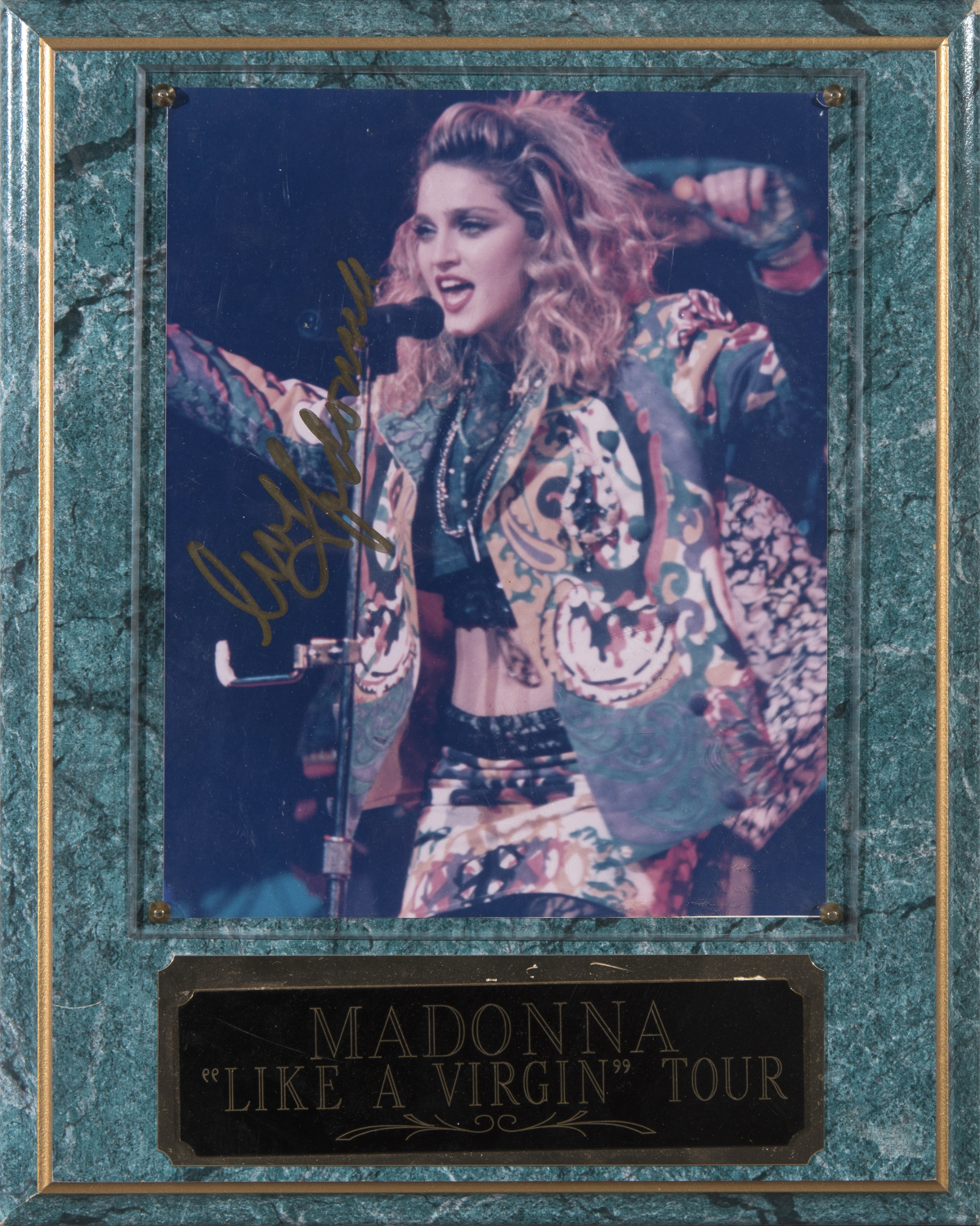 Appraisal: AUTOGRAPHED AND MOUNTED PHOTOGRAPH OF MADONNA LIKE A VIRGIN TOUR