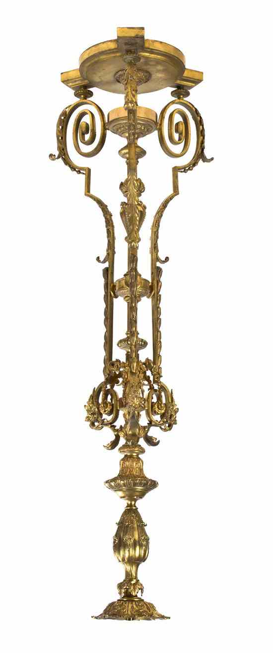 Appraisal: A Gilt Bronze Neoclassical Torchiere having a baluster foliate cast