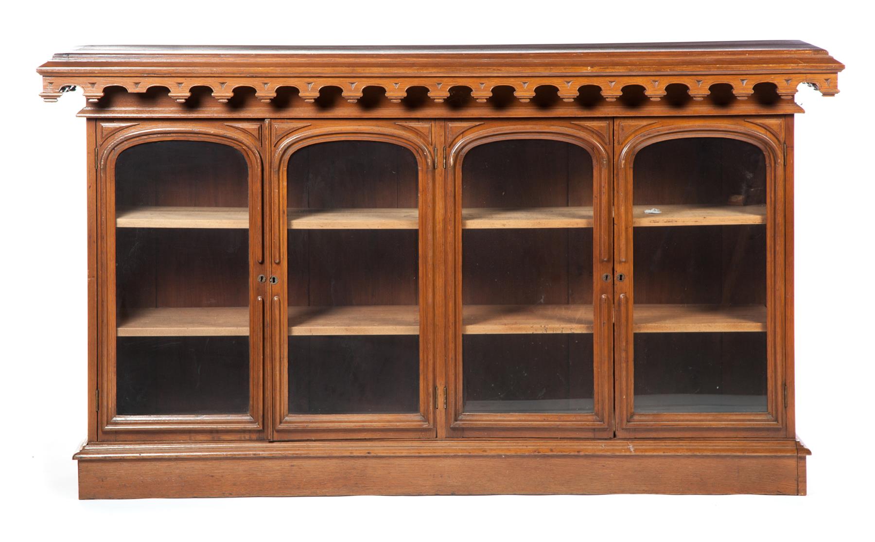 Appraisal: FOUR-DOOR LOW BOOKCASE American th century oak Victorian-Italianate-style with four