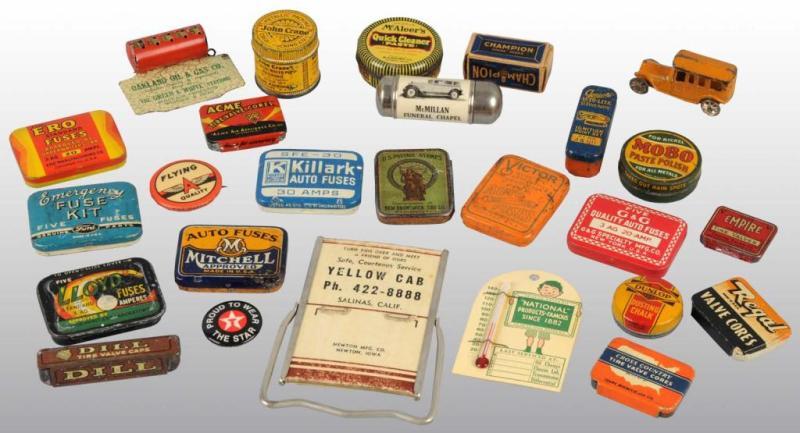 Appraisal: Lot of Automobile-Related Advertising Pieces Description Includes pin backs spark