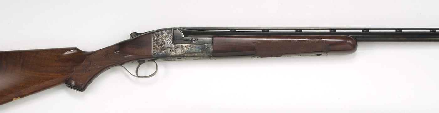 Appraisal: ITHACA SINGLE-BARREL TRAP SHOTGUN ga Serial Vent-ribbed barrel Blued finish