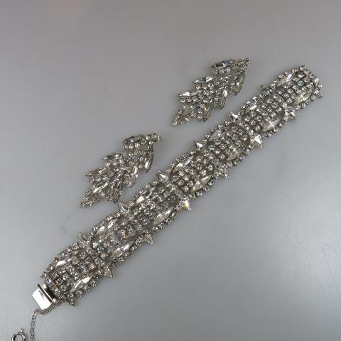 Appraisal: Sherman silver tone metal bracelet set with clear rhinestones together