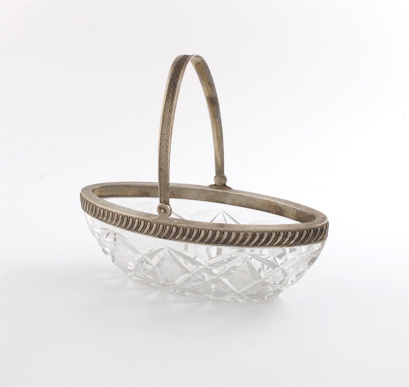 Appraisal: A Russian silver mounted cut glass swing-handled bowl