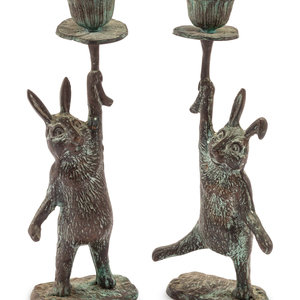 Appraisal: A Pair of Patinated Cast Metal Rabbit Candlesticks Height inches