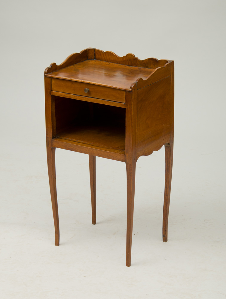 Appraisal: LOUIS XV PROVINCIAL WALNUT BEDSIDE TABLE With a three-quarter-gallery above