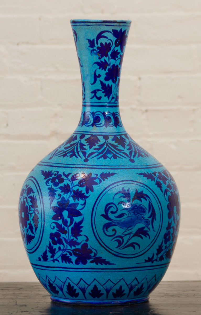 Appraisal: BLUE-GLAZED BOTTLE VASE DECORATED IN THE PERSIAN TASTE x in