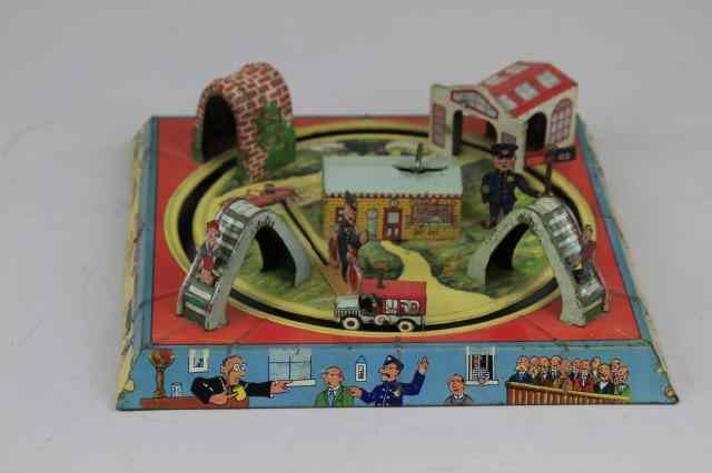 Appraisal: PINCHED WIND UP TOY Louis Marx lithographed tin clockwork amusing