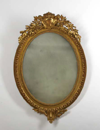 Appraisal: Louis XVI-Style Giltwood Looking Glass mid- th century the oval