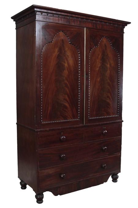 Appraisal: A th century mahogany linen press the projected moulded cornice