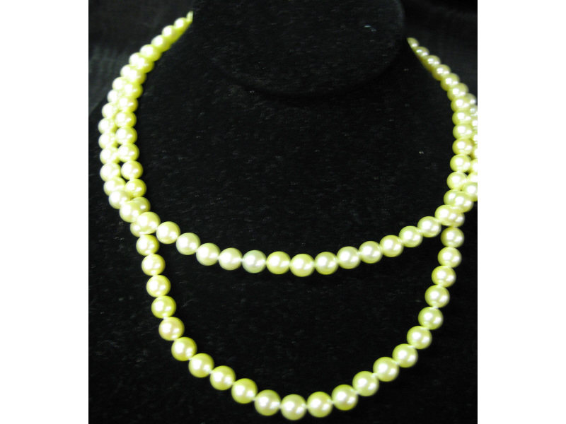 Appraisal: PEARL NECKLACE Double strand of - mm cream color pearls