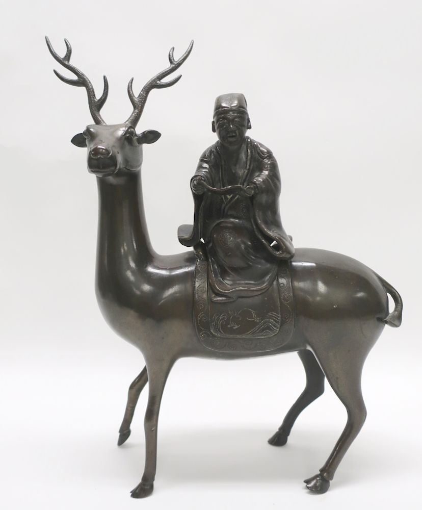 Appraisal: Japanese Deer Censer Bronze cast deer with removable figure of