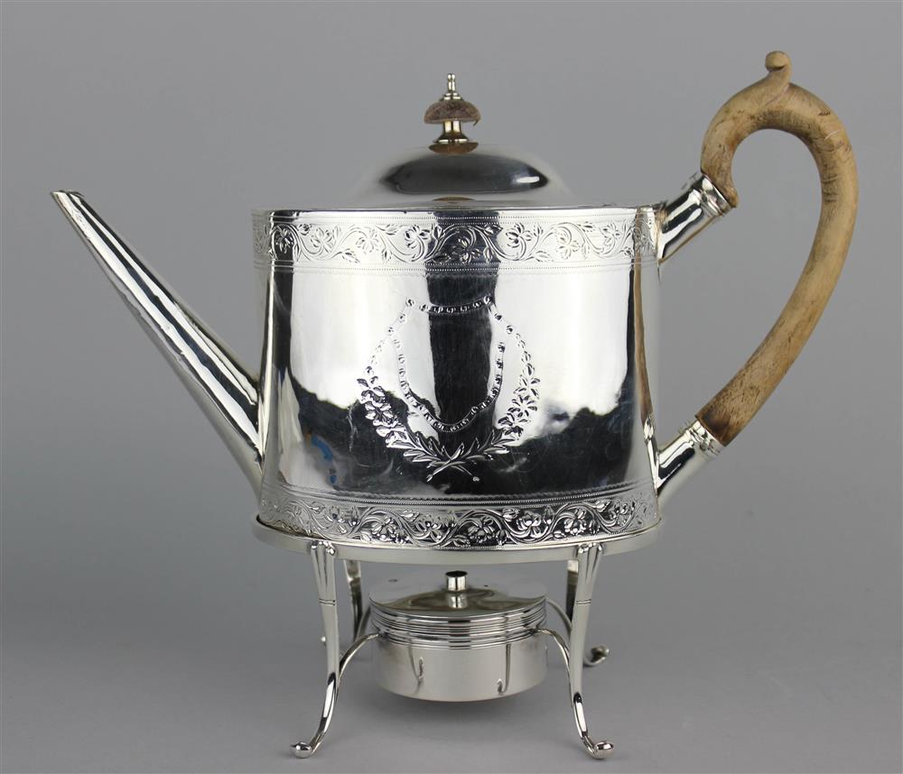 Appraisal: GEORGE III SILVER OVAL TEAPOT AND A TEAPOT BURNER STAND