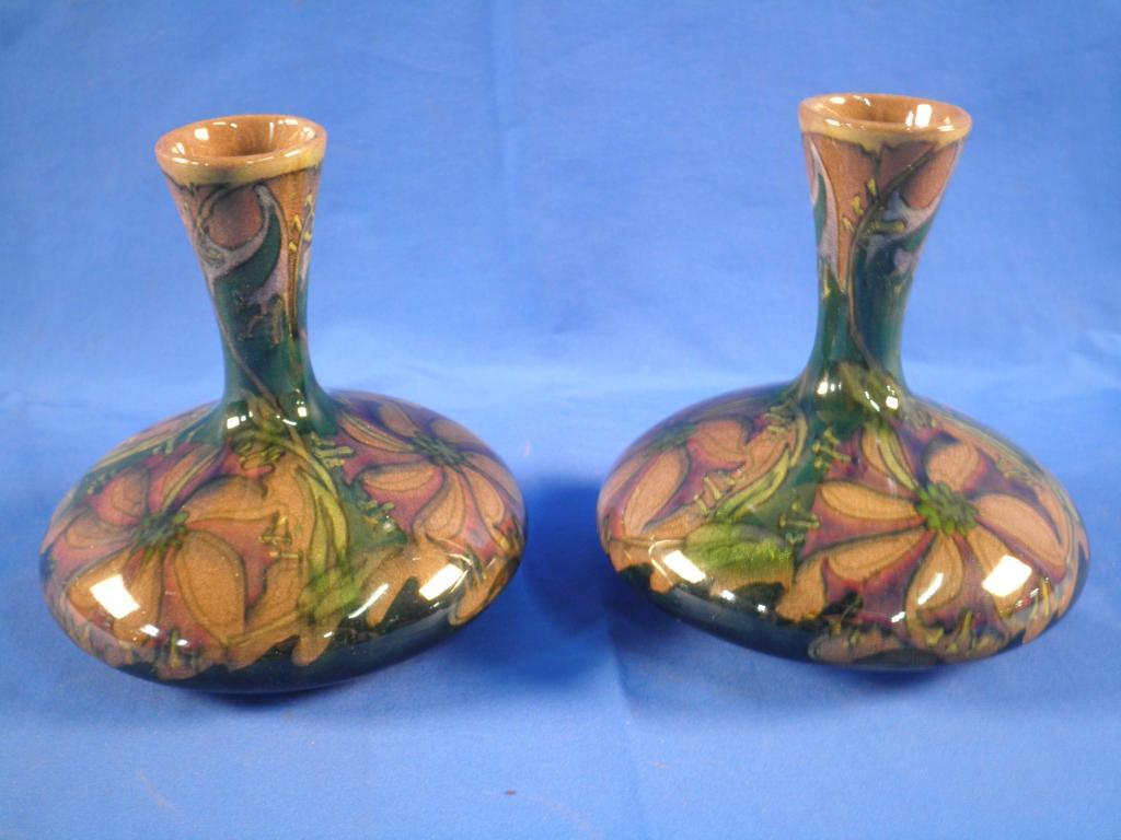 Appraisal: A pair of Zuid Holland pottery vases each decorated with