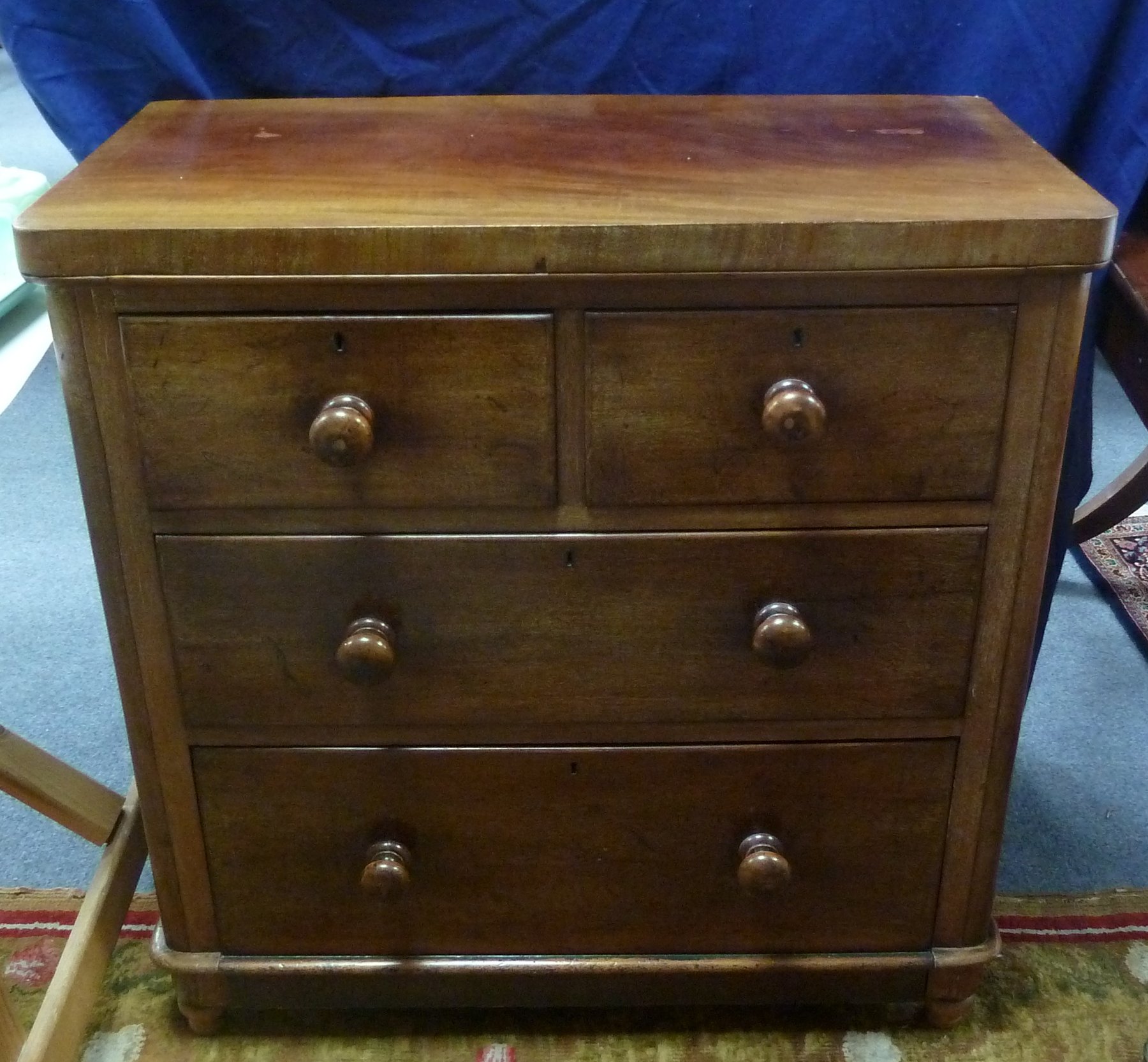 Appraisal: A mahogany chest of two long and two short drawers