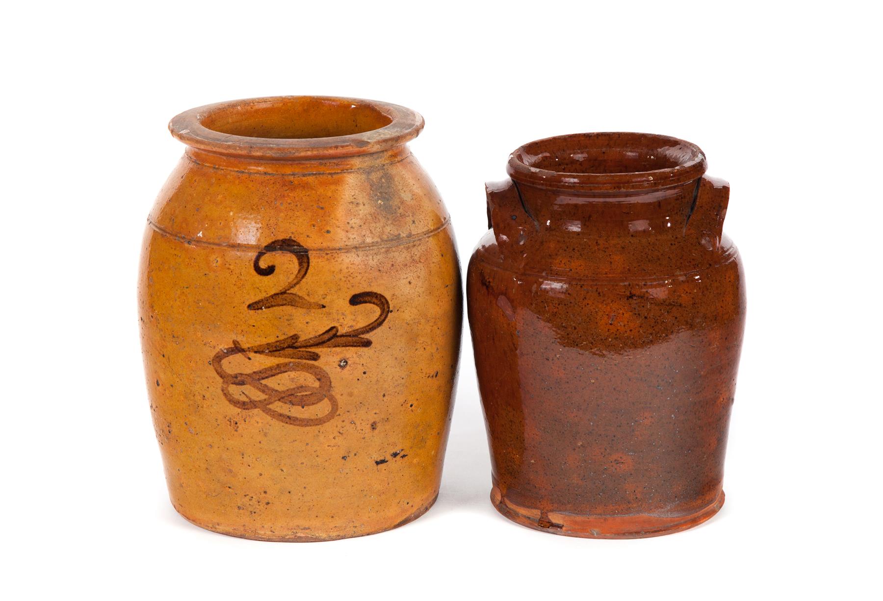 Appraisal: TWO AMERICAN REDWARE CROCKS One crock with manganese glaze h