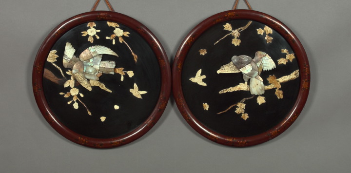 Appraisal: Pair of Circular Japanese Meiji Carved Bone- and Mother-of-Pearl-Mounted Black