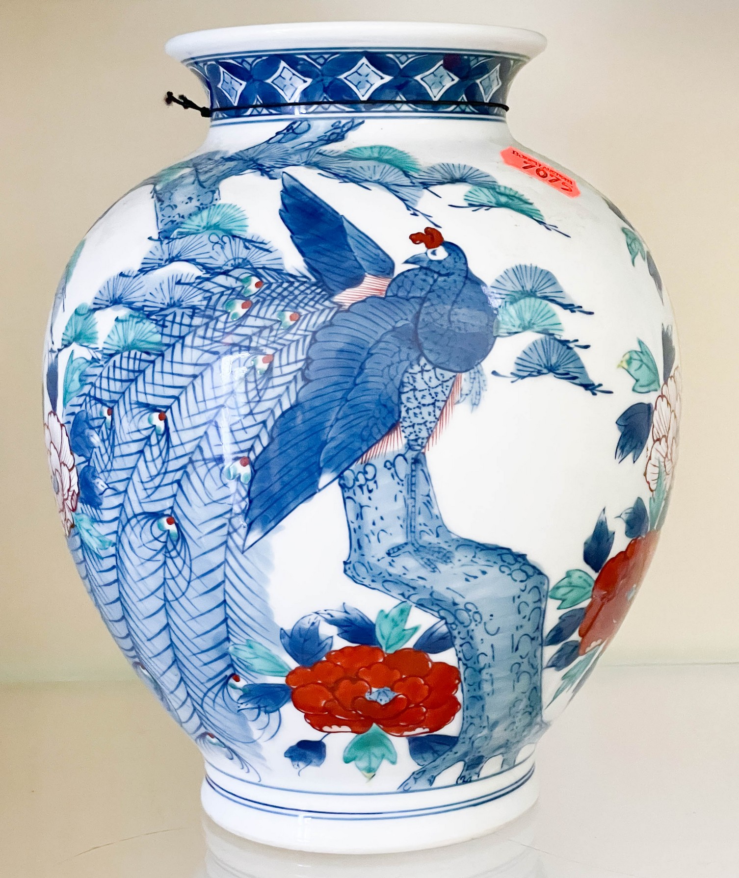 Appraisal: Japanese porcelain vase peacock decoration -character mark to base -