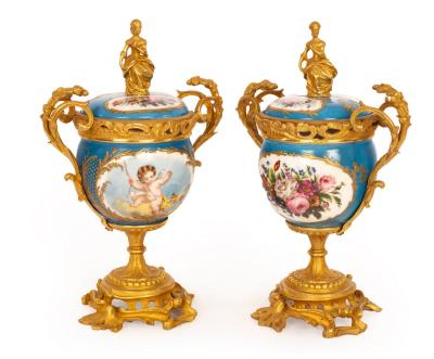 Appraisal: A pair of S vres style cups and covers the