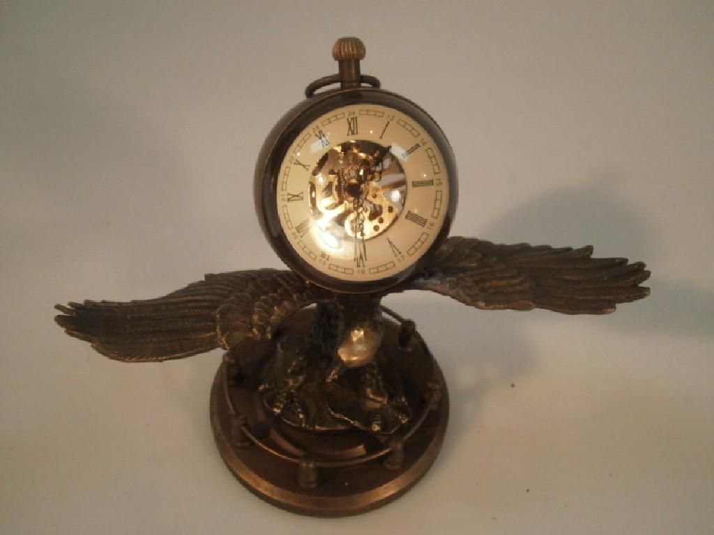 Appraisal: A Chinese timepiece which is mounted on a metal cast