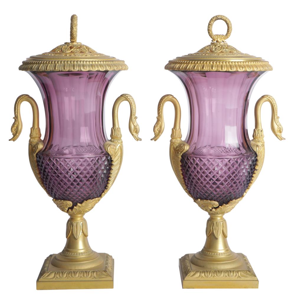 Appraisal: PAIR OF AMETHYST CUT-GLASS URNSwith gilt metal mounts inches wide