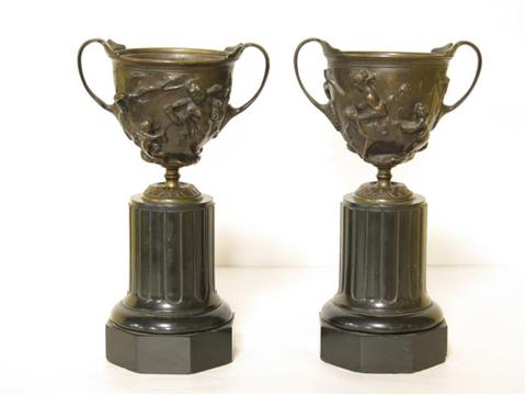 Appraisal: PAIR OF BRONZE TWO-HANDLED URNS AFTER THE ANTIQUEPAIR OF GRAND