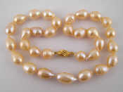 Appraisal: A South Sea cultured pearl necklace with a yellow metal