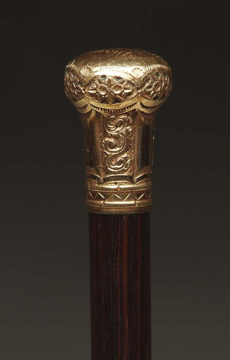 Appraisal: GOLD HEADED WALKING STICK Gold handle with engraved repoussed design