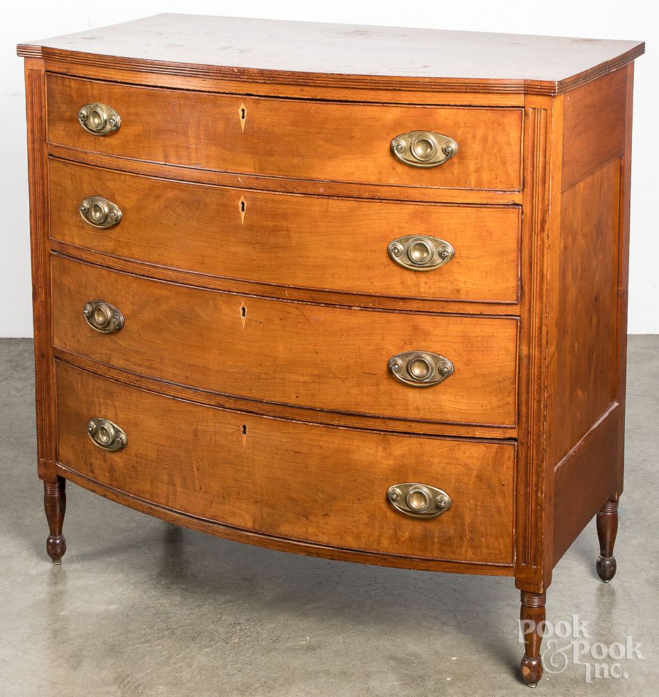 Appraisal: Pennsylvania Sheraton cherry bowfront chest Pennsylvania Sheraton cherry bowfront chest