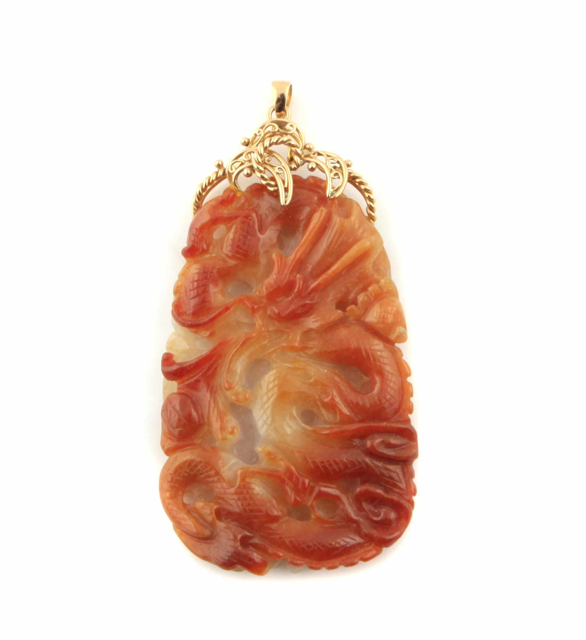 Appraisal: A carved multi-colored jade and k gold pendant dimensions x